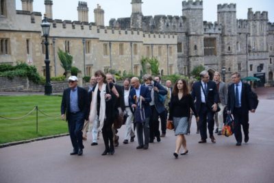 Group of researchers and GPP partners walk outside Windsor Castle